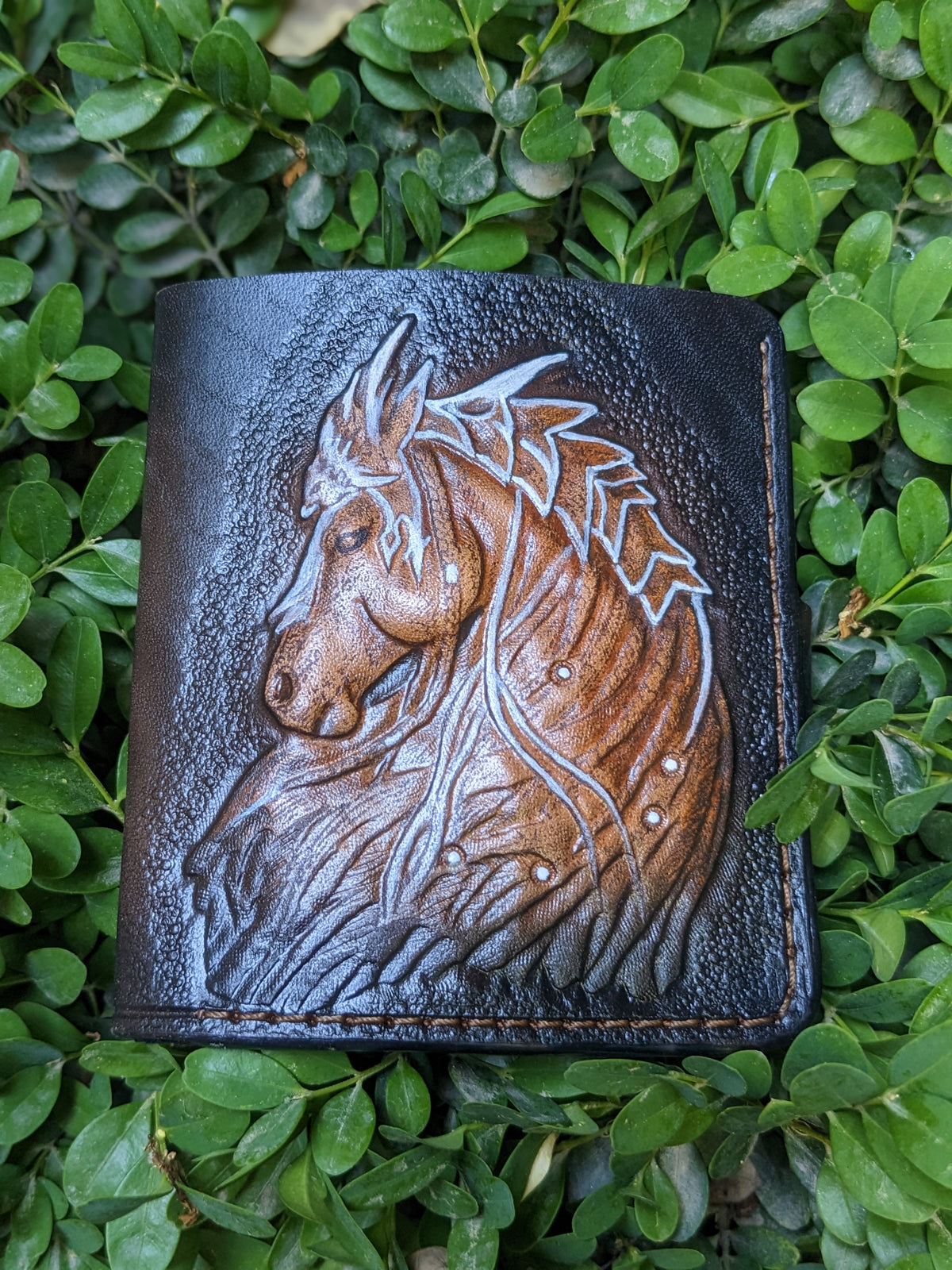 Stylish women's leather purse and minimalist wallet collection, featuring bifold, RFID, custom, handmade, biker, tooled, and embossed designs in premium leather.