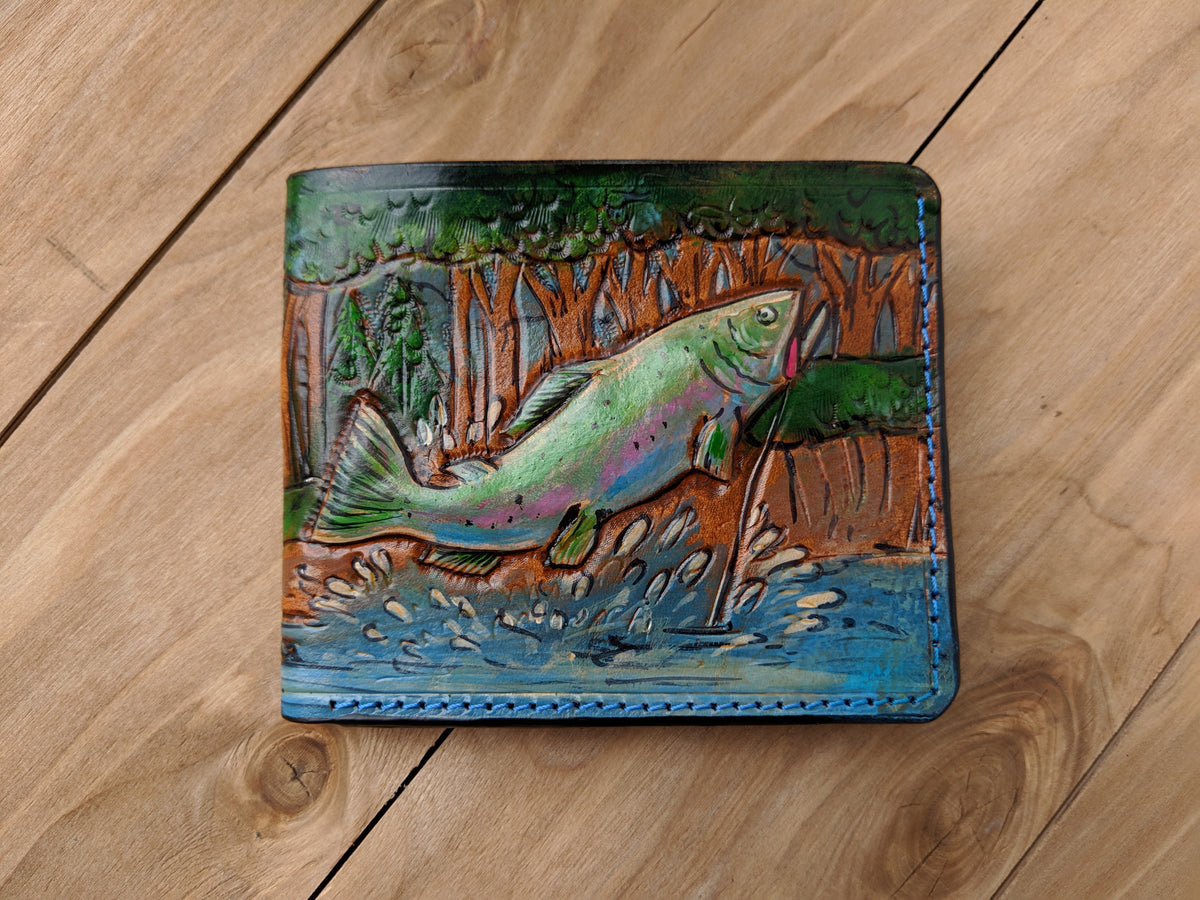 Handmade leather bifold wallet with carved bass fishing design, perfect gift for bikers