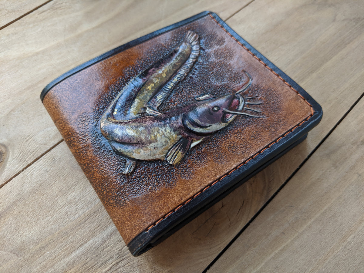 Handmade leather bifold wallet with painted catfish design, perfect Father’s Day gift for fishermen