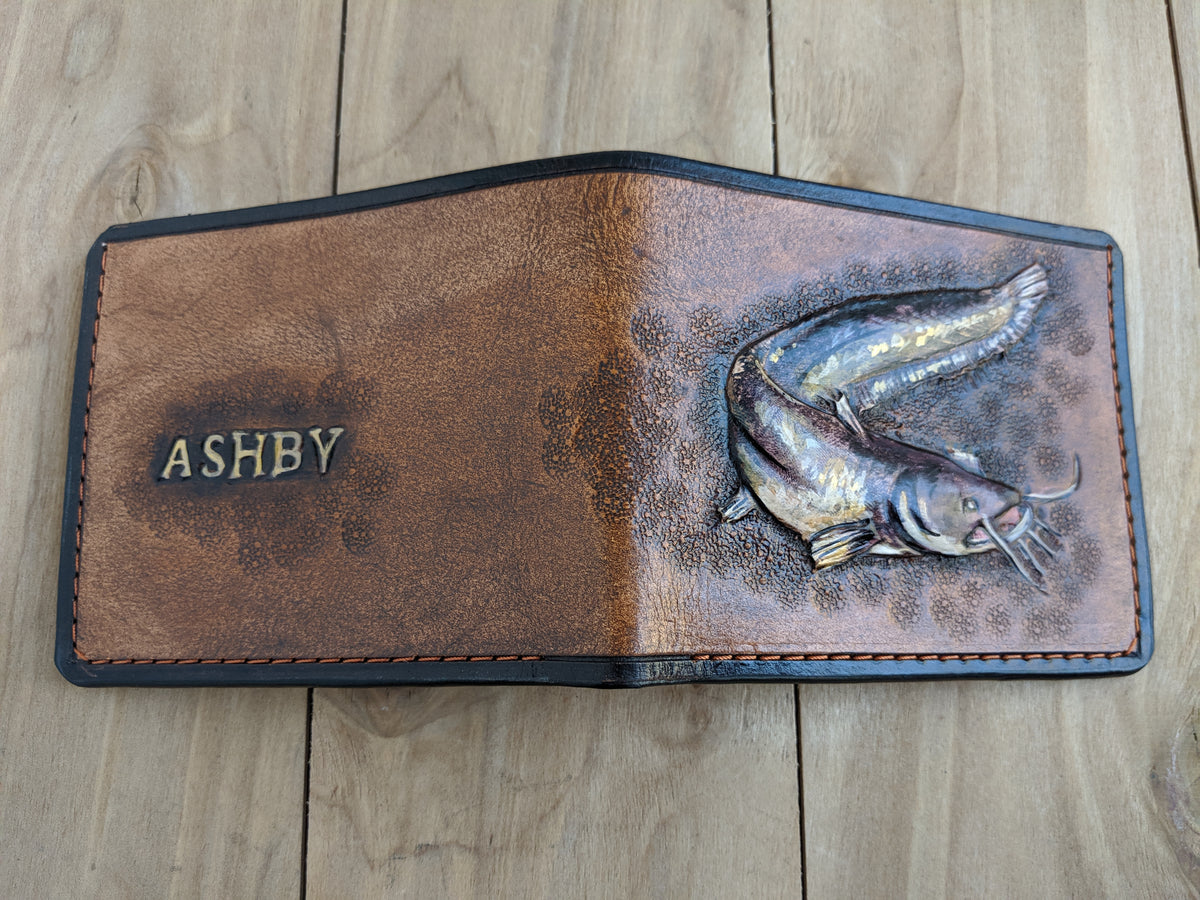 Handmade leather bifold wallet with carved catfish design, perfect Father’s Day gift for fish lovers