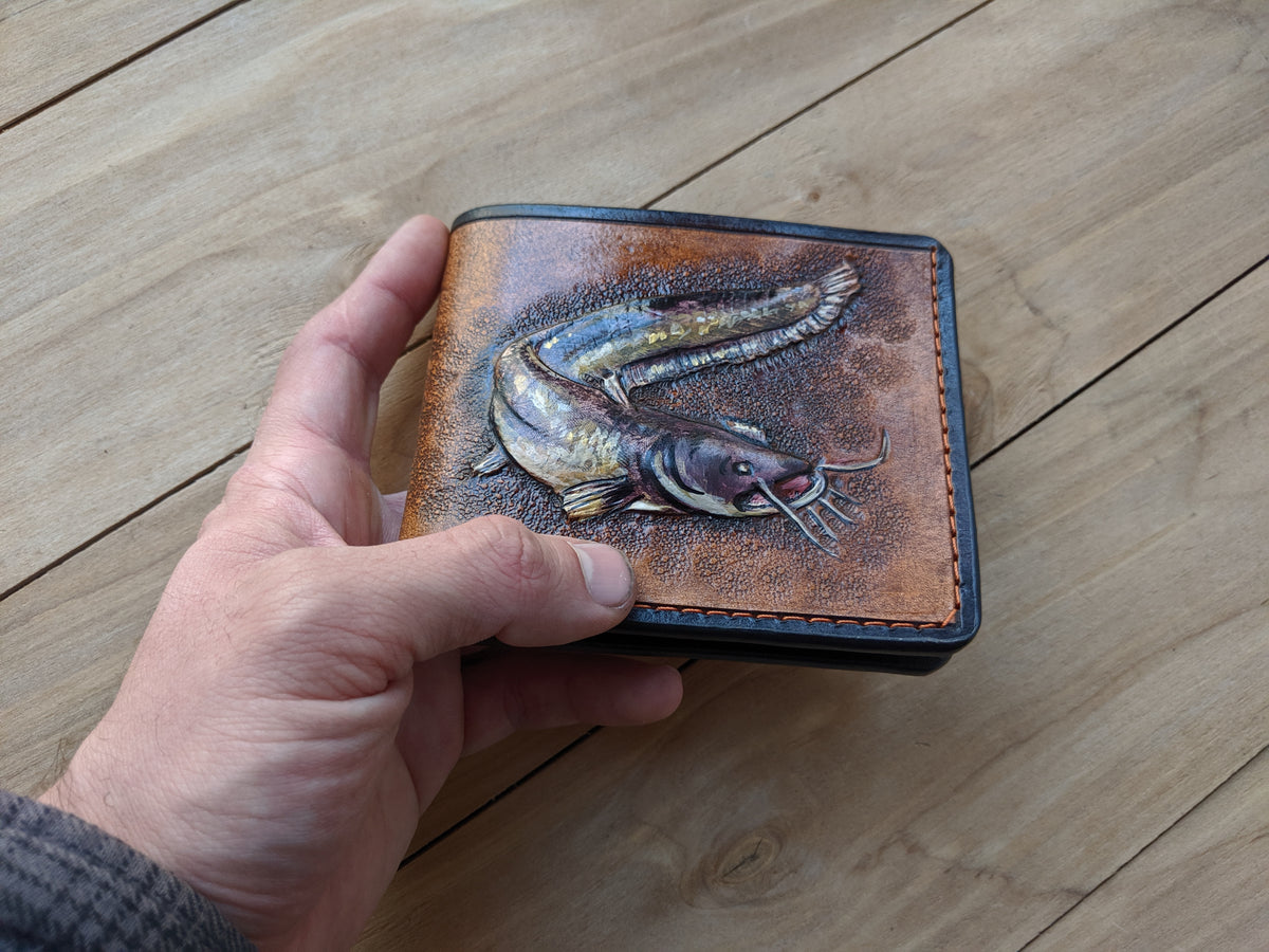 Handmade leather bifold wallet with embossed catfish design, perfect gift for anglers and fish lovers