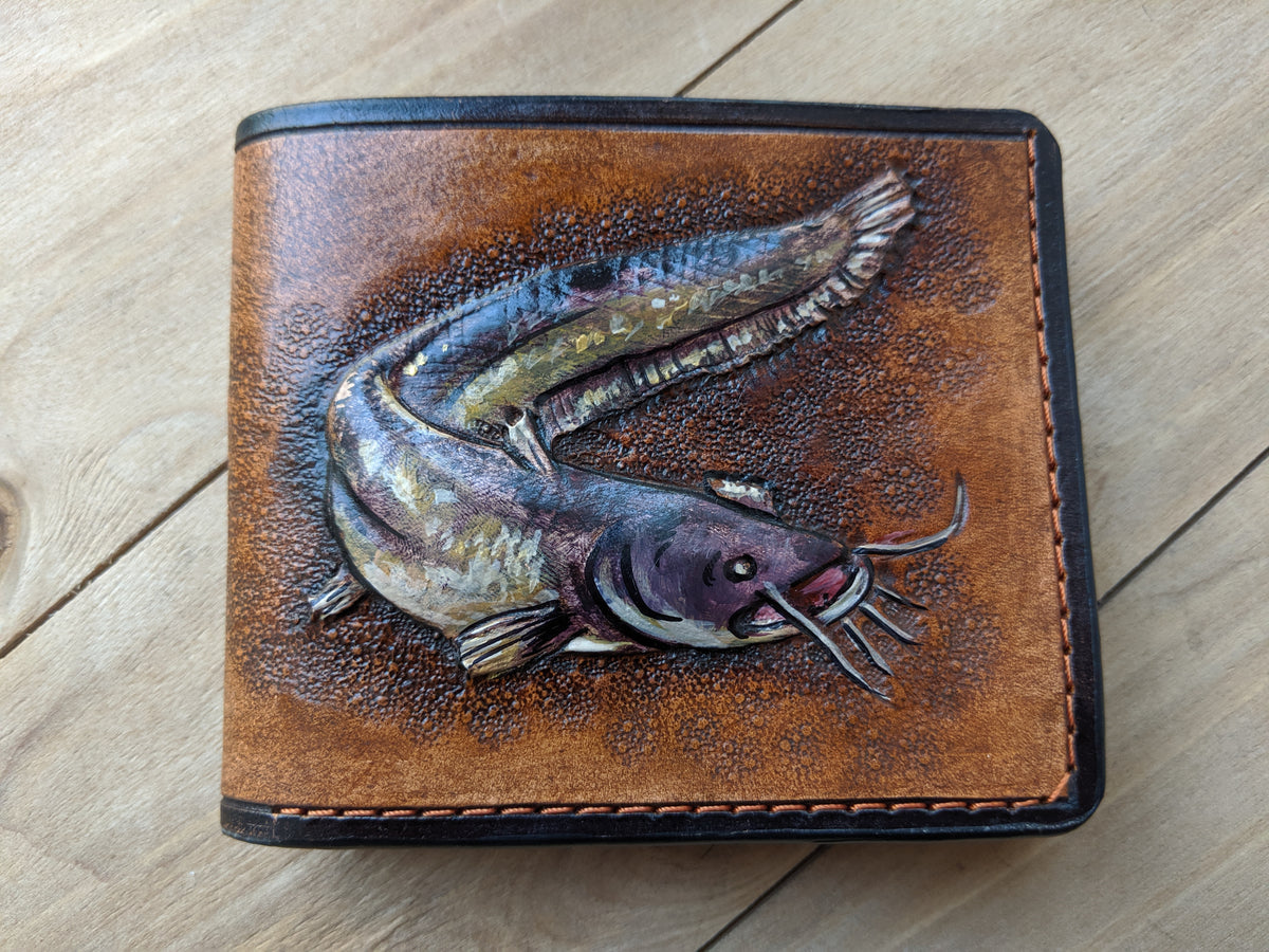 Handmade leather bifold wallet with embossed catfish design, perfect gift for fishermen and outdoorsmen
