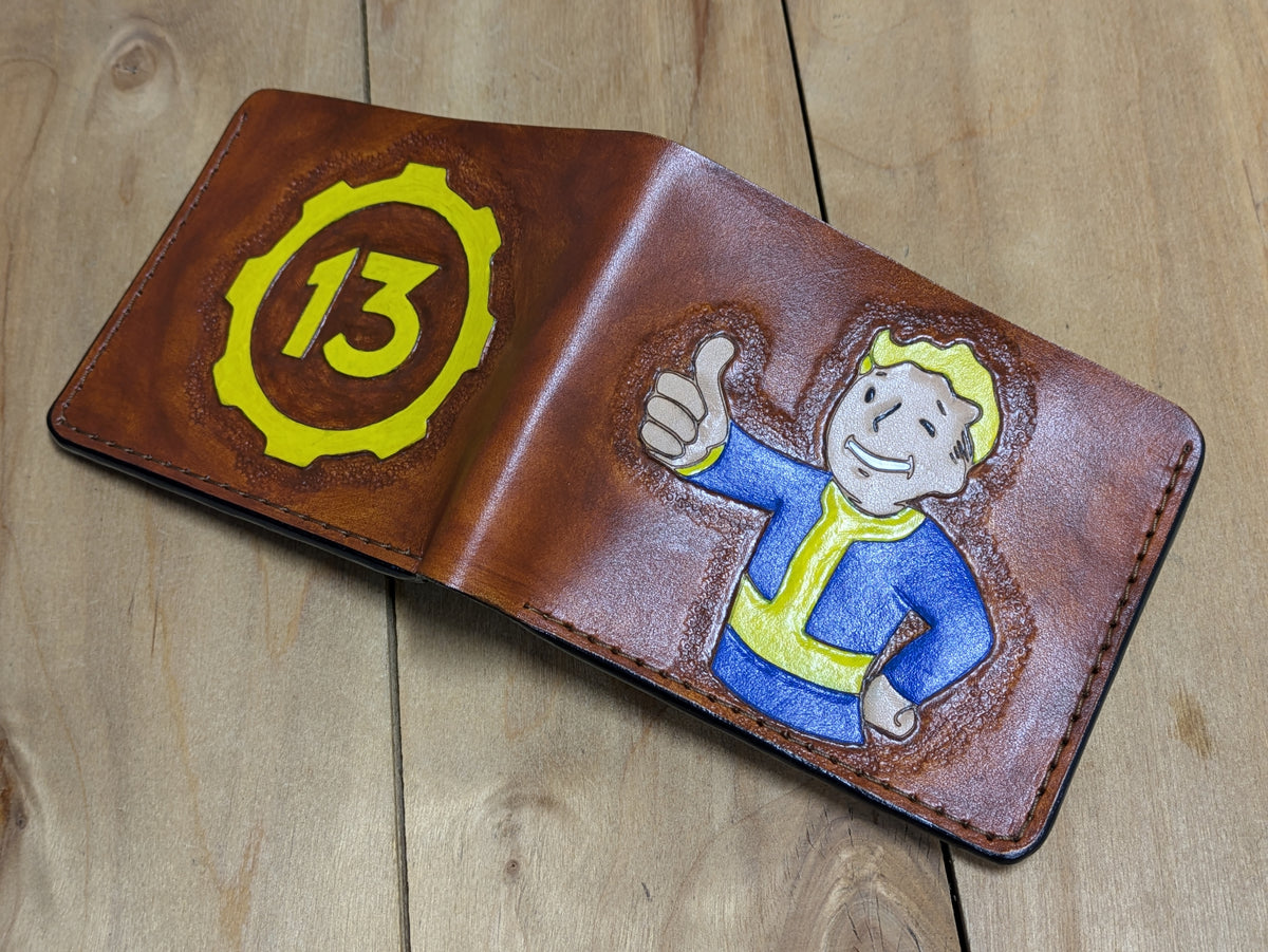 M1J52, Fallout Embossed Leather Bifold Wallet | Vault Boy, Vault 13, & Vault-Tec Design