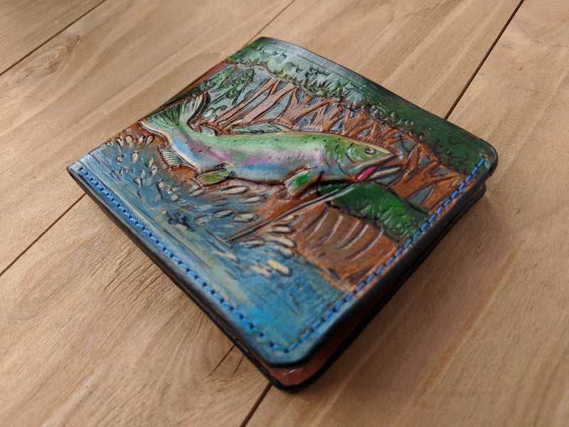 Handmade leather bifold wallet with carved bass fishing design, perfect gift for outdoor enthusiasts