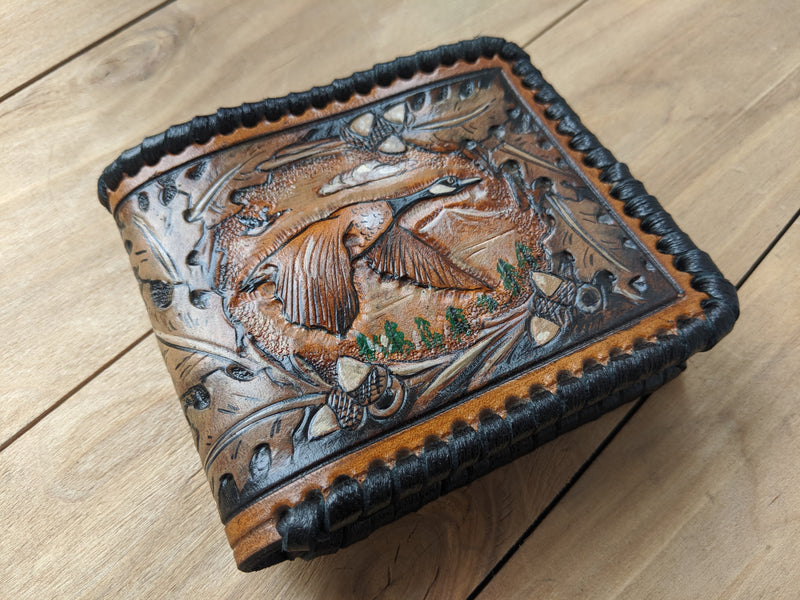 Handmade leather bifold wallet with carved goose hunting design, perfect Father's Day gift for hunters