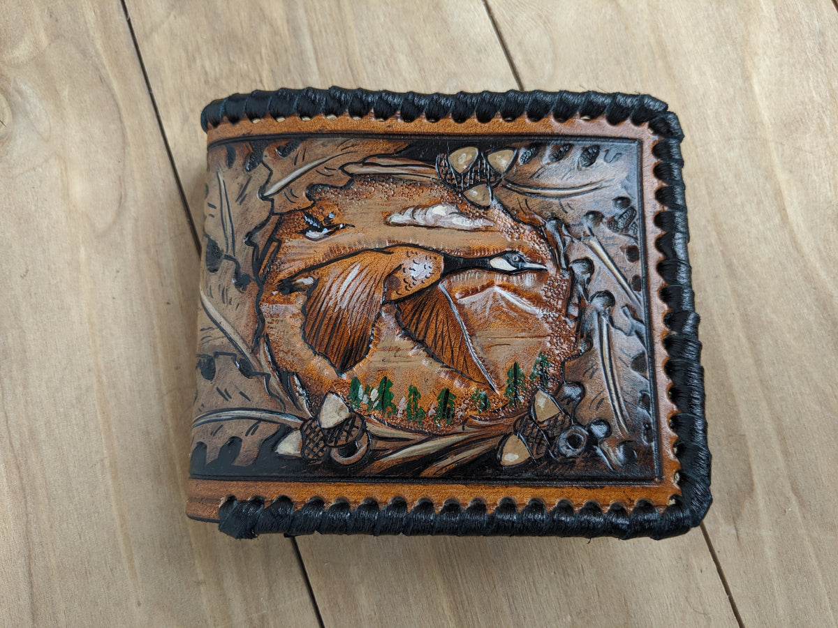 Handmade leather bifold wallet with embossed pheasant hunting design, perfect Father's Day gift for him