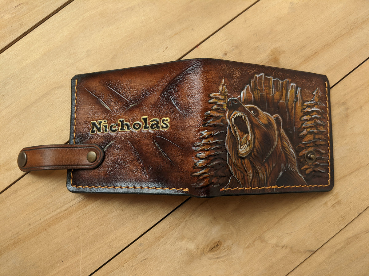 Handmade leather bifold wallet with embossed grizzly bear, perfect gift for bikers and bear lovers