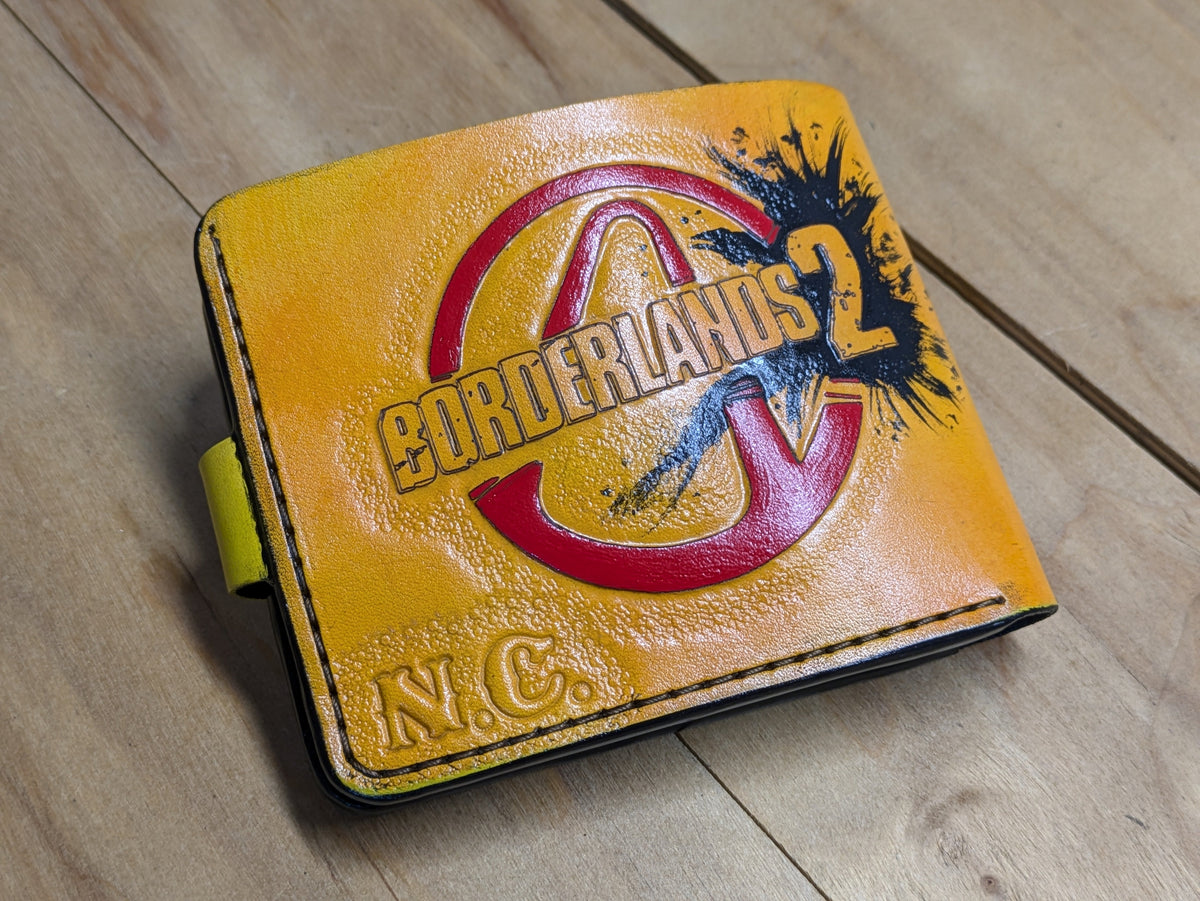 M1J53, Borderlands 2, Krieg the Psycho Bifold Leather Wallet - Theodoros