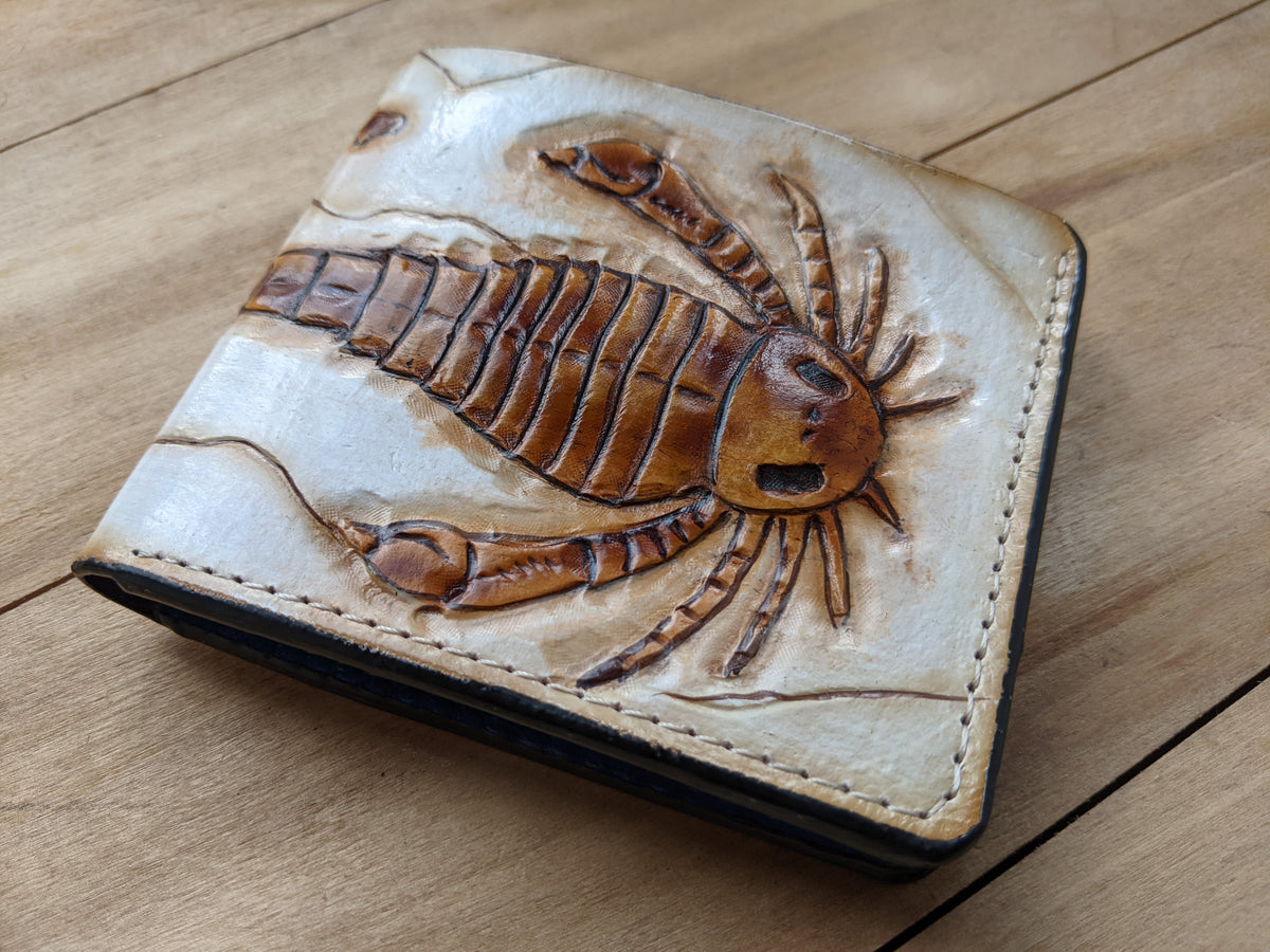 Handmade Eurypterid Sea Scorpion bifold leather wallet with fossil embossed design. Perfect gift for him with RFID protection.